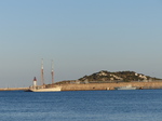 FZ027442 Old sailboat by lighthouse.jpg